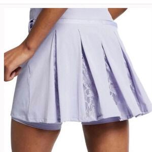 Nike women’s flex pleated lace golf skirt sz xs in excellent like-new condition